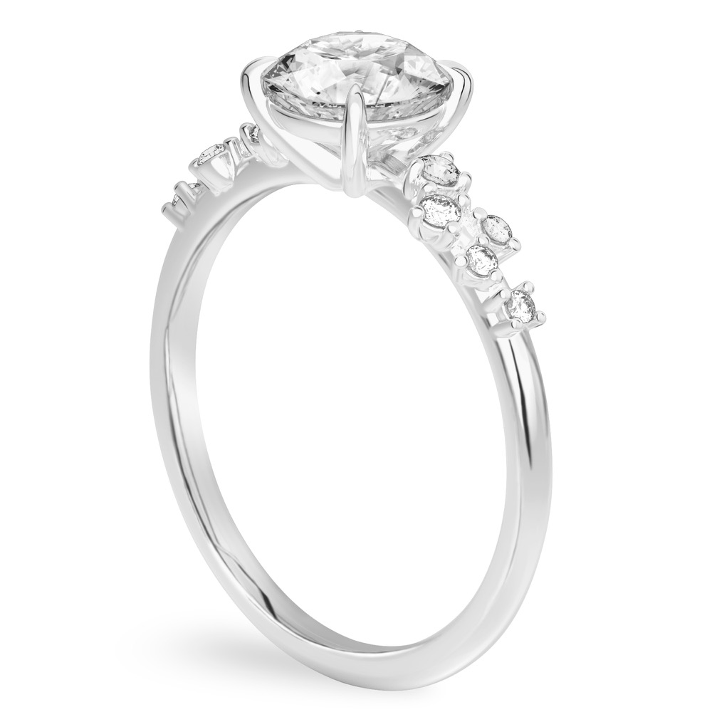 basket engagement ring with scatterd side diamonds white gold