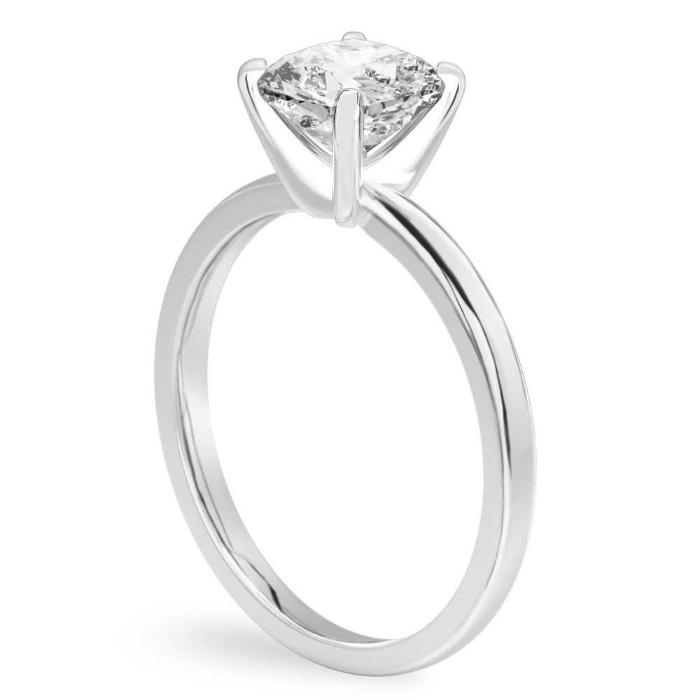 Angle view of cushion cut diamond classic solitaire engagement ring in white gold