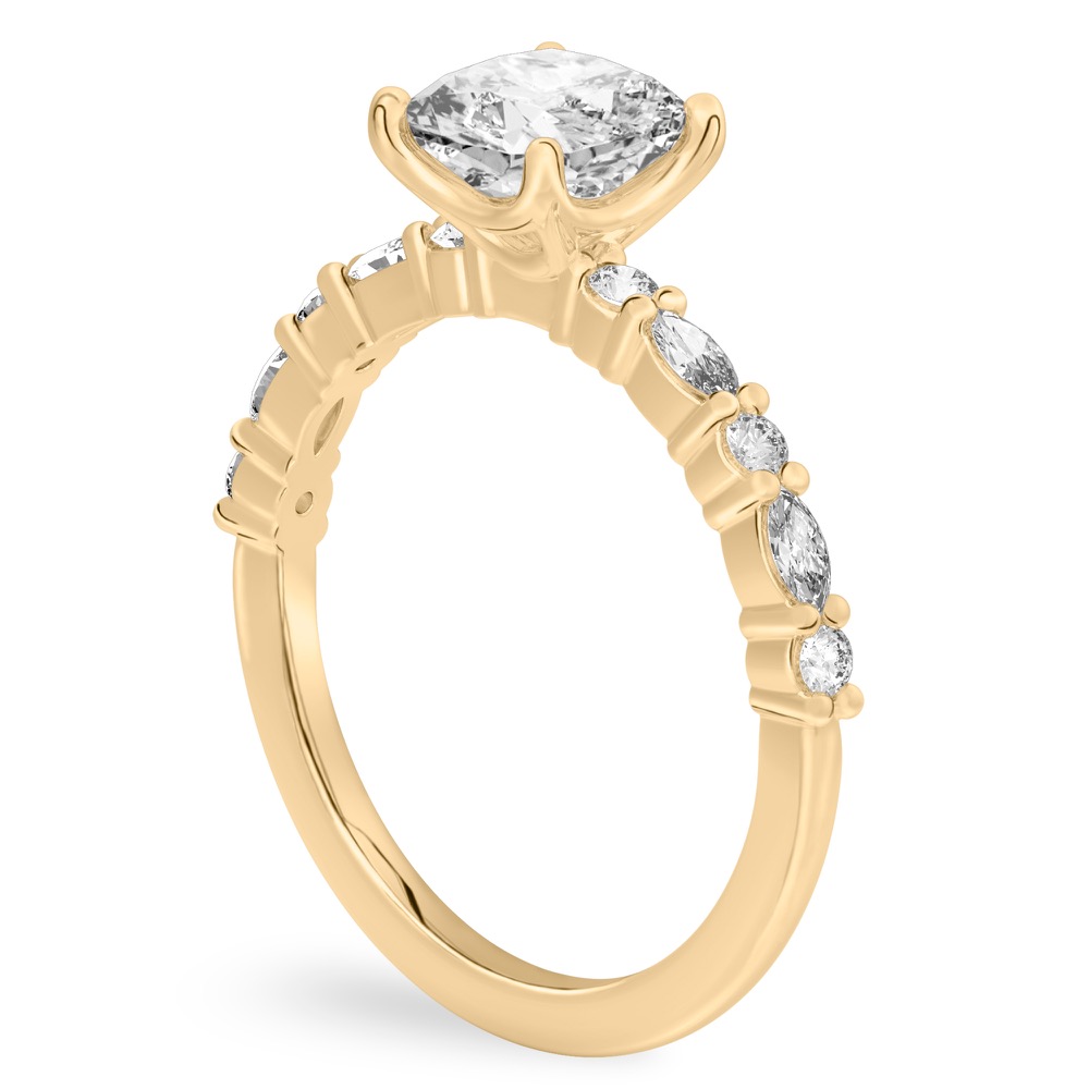 Angle view of cushion cut diamond marquise and round diamond ring yellow gold