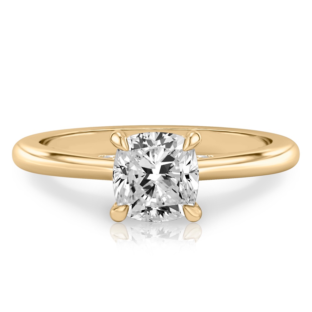 cushion cut diamond pave bridge engagement ring in yellow gold