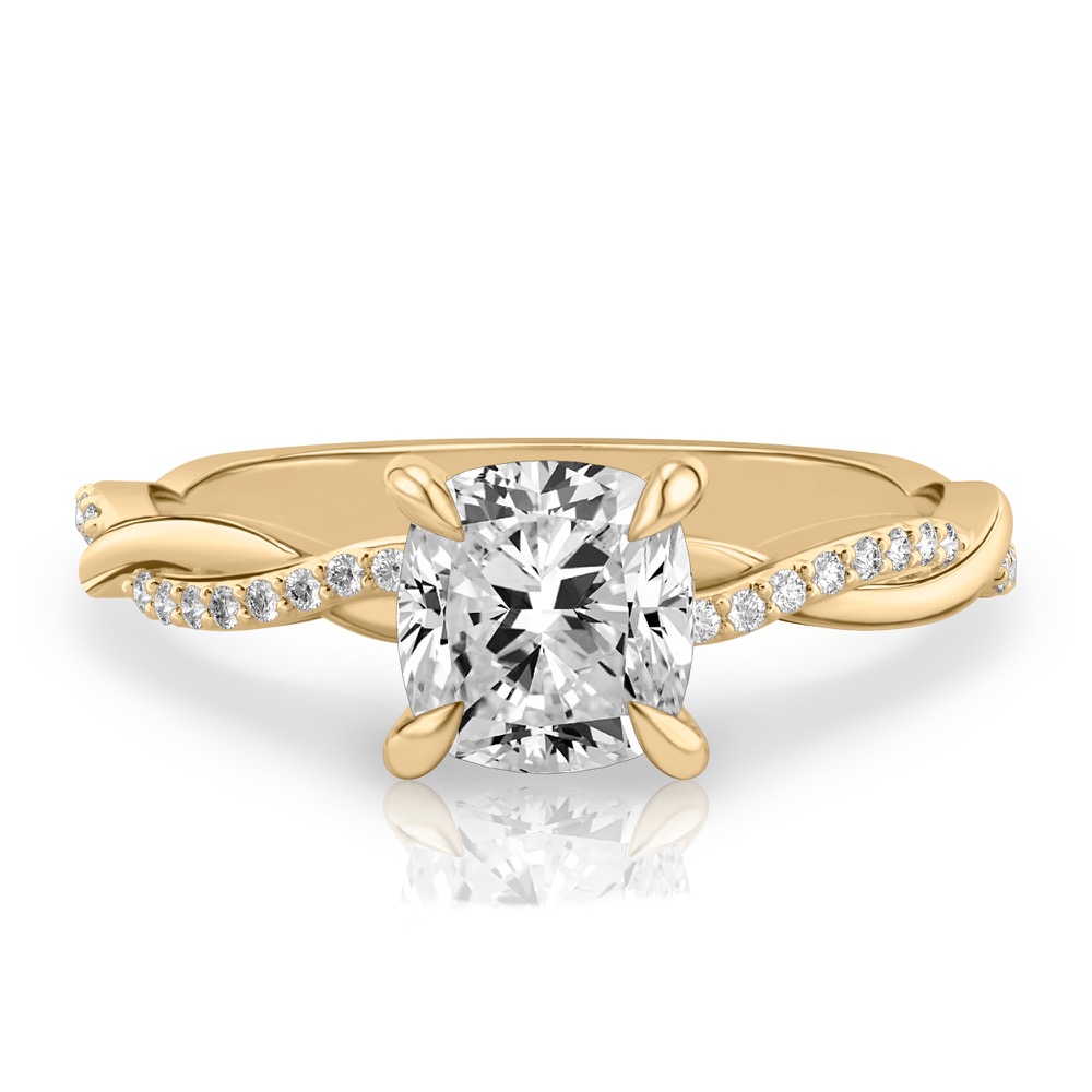 cushion cut diamond twist engagement ring yellow gold