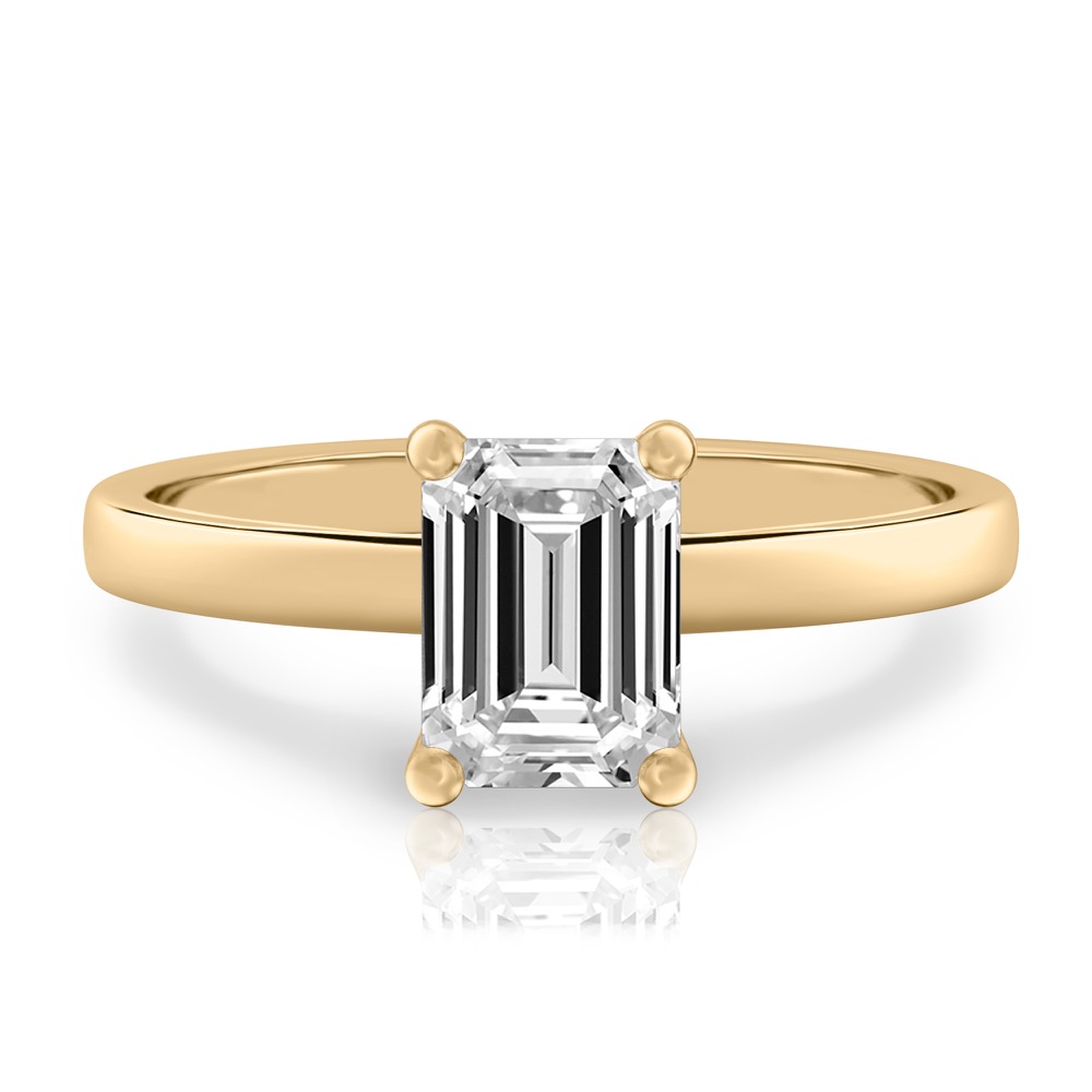 emerald cut diamond basket setting engagement ring yellow gold