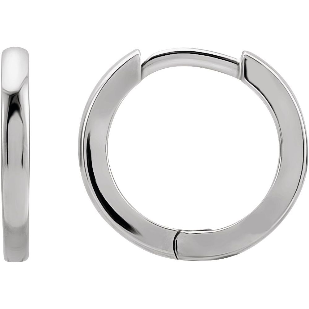 Angle view of huggie earrings white gold