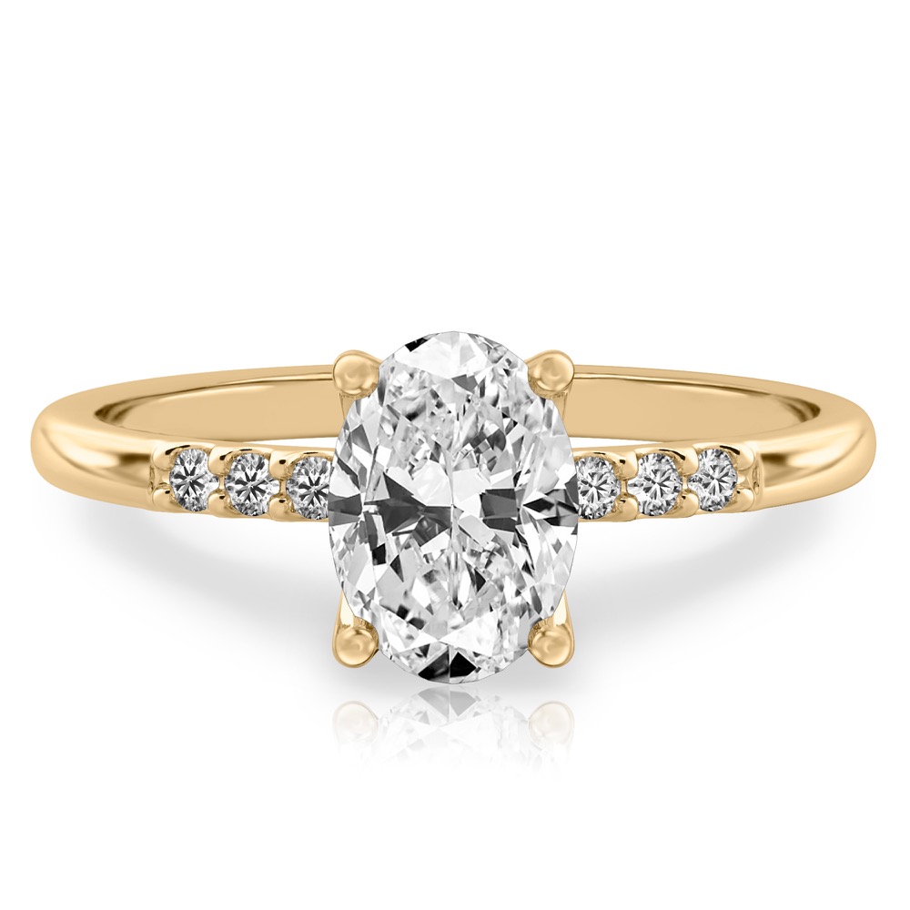 oval cut diamond minimalist pave engagement ring in yellow gold