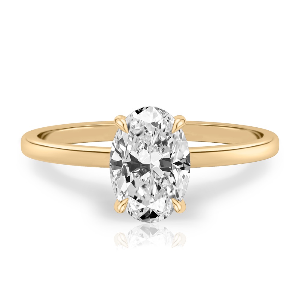 oval shape diamond ultra low hidden halo engagement ring in yellow gold