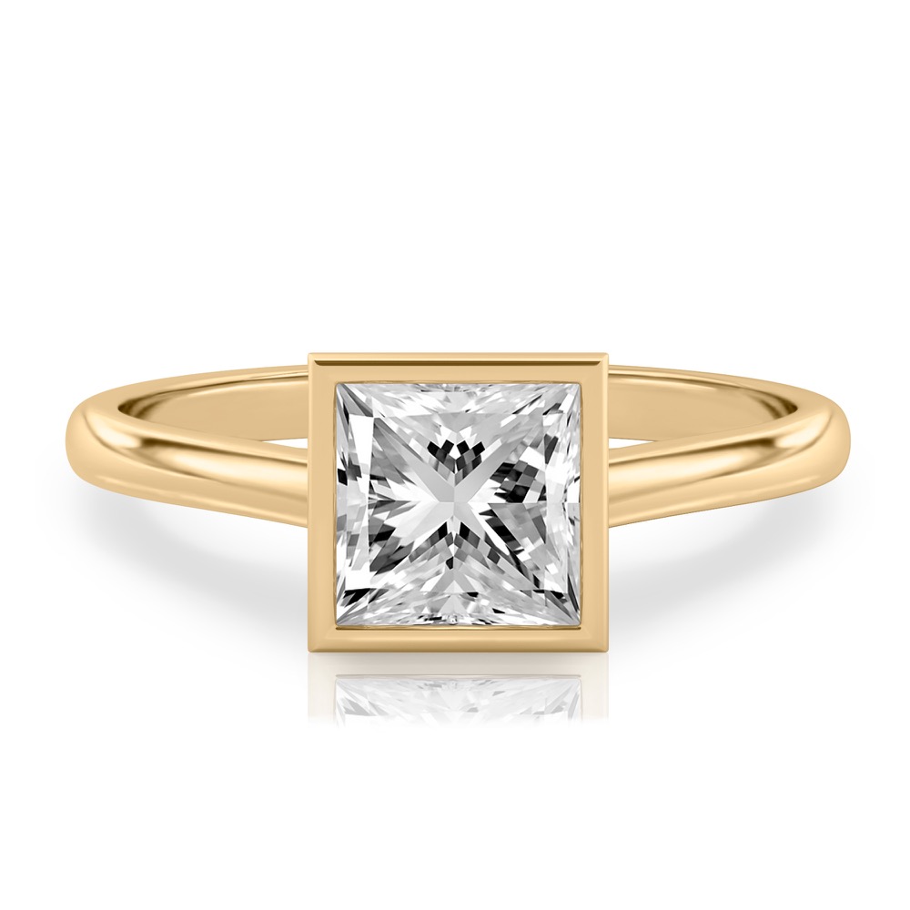 princess cut diamond bezel engagement ring in yellow gold