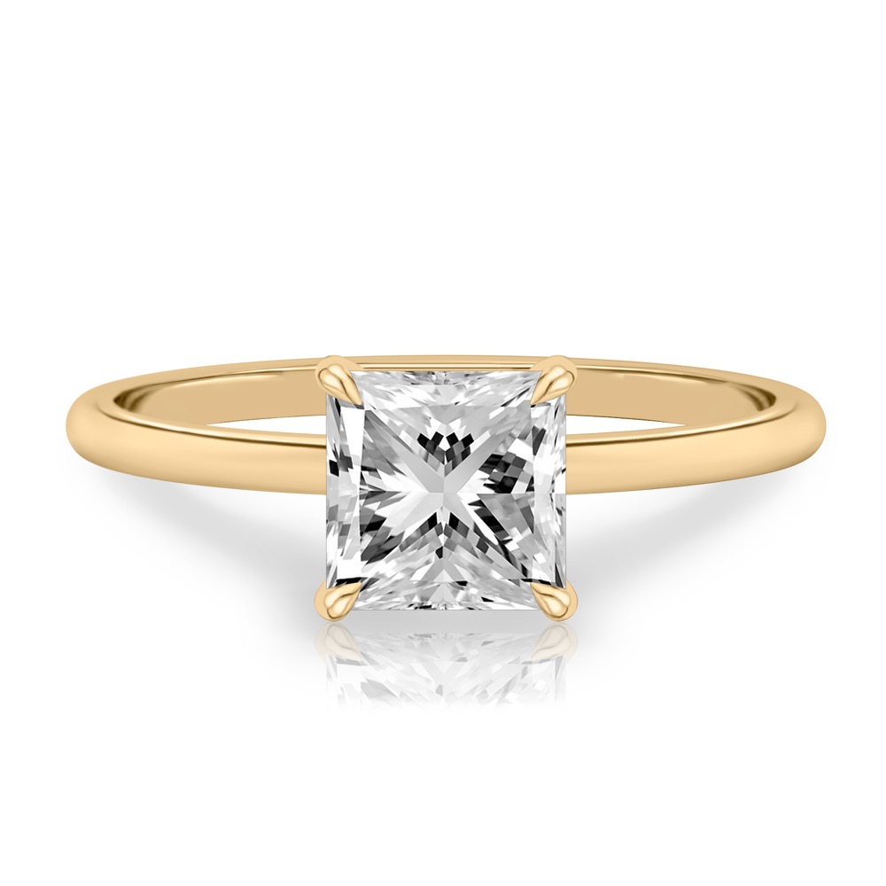 princess cut diamond delicate solitaire engagement ring in yellow gold