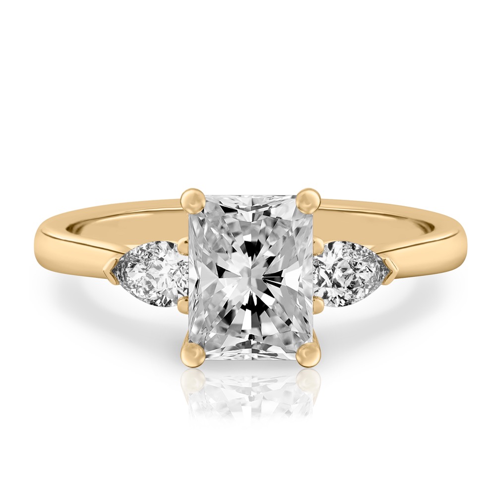 radiant cut diamond pear side stone engagement ring yellow gold