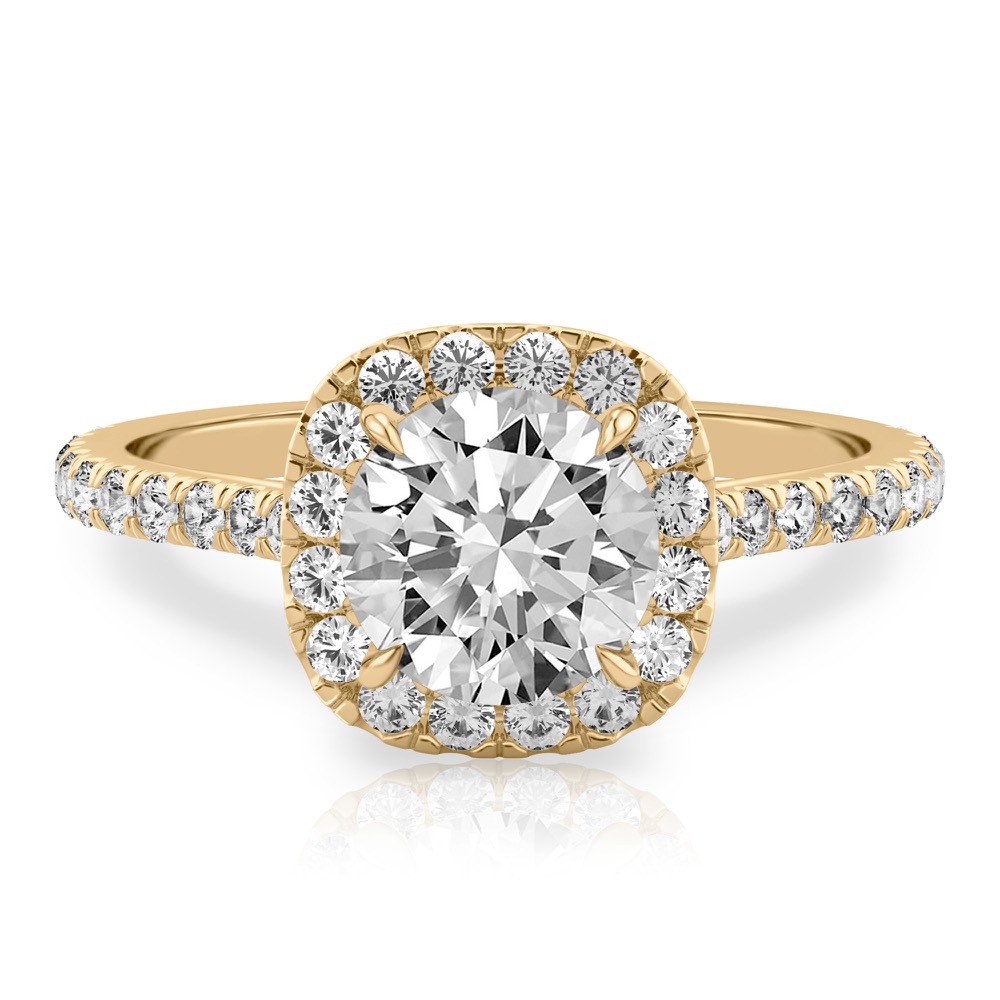 round cut diamond cushion halo engagement ring in yellow gold