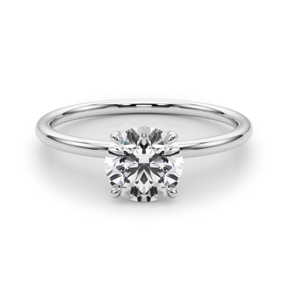 round cut diamond dainty solitaire engagement ring in white gold