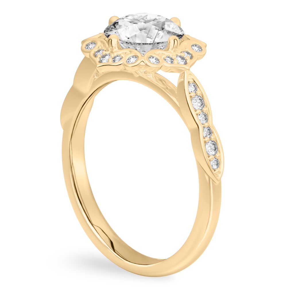 Angle view of round cut diamond floral engagement ring in yellow gold