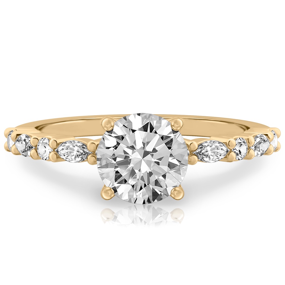 round cut diamond marquise and round diamond ring yellow gold