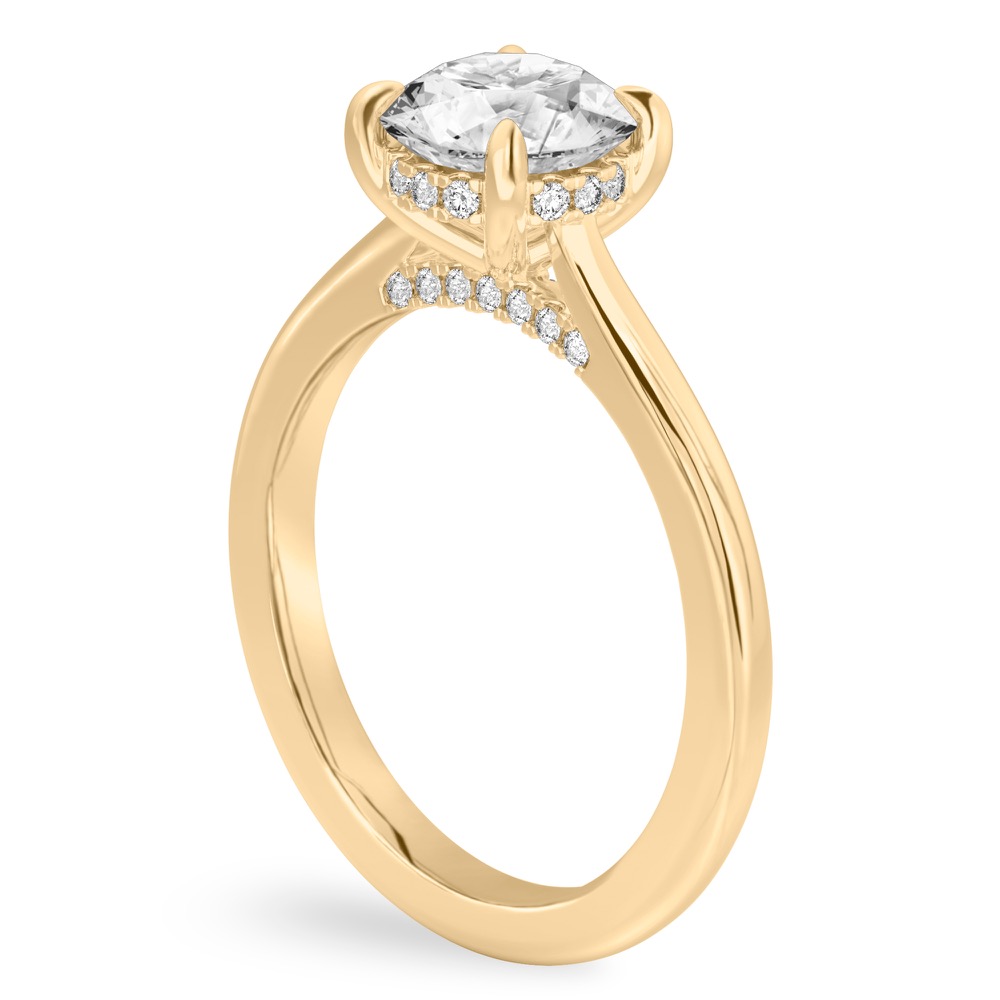 Angle view of round cut diamond pave bridge engagement ring in yellow gold