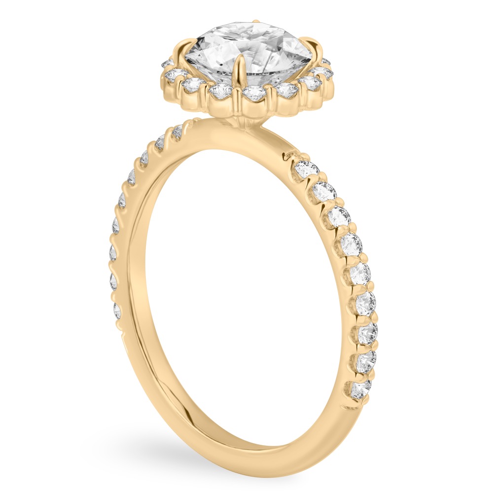 Angle view of round cut diamond scalloped halo engagement ring yellow gold