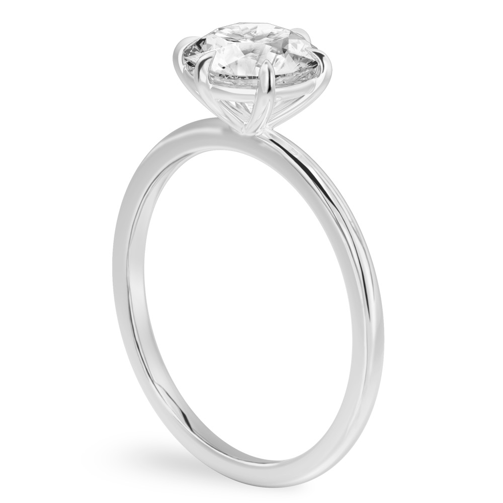 round cut diamond six prong delicate solitaire engagement ring white gold angle