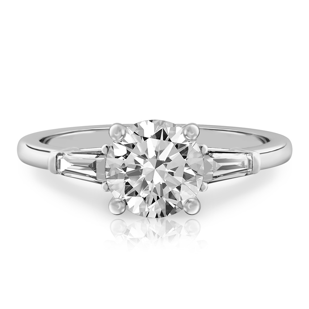 round cut diamond tapered baguette engagement ring in white gold