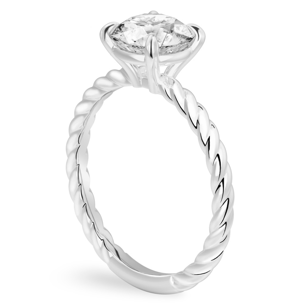 Angle view of round cut diamond twisted rope engagement ring in white gold